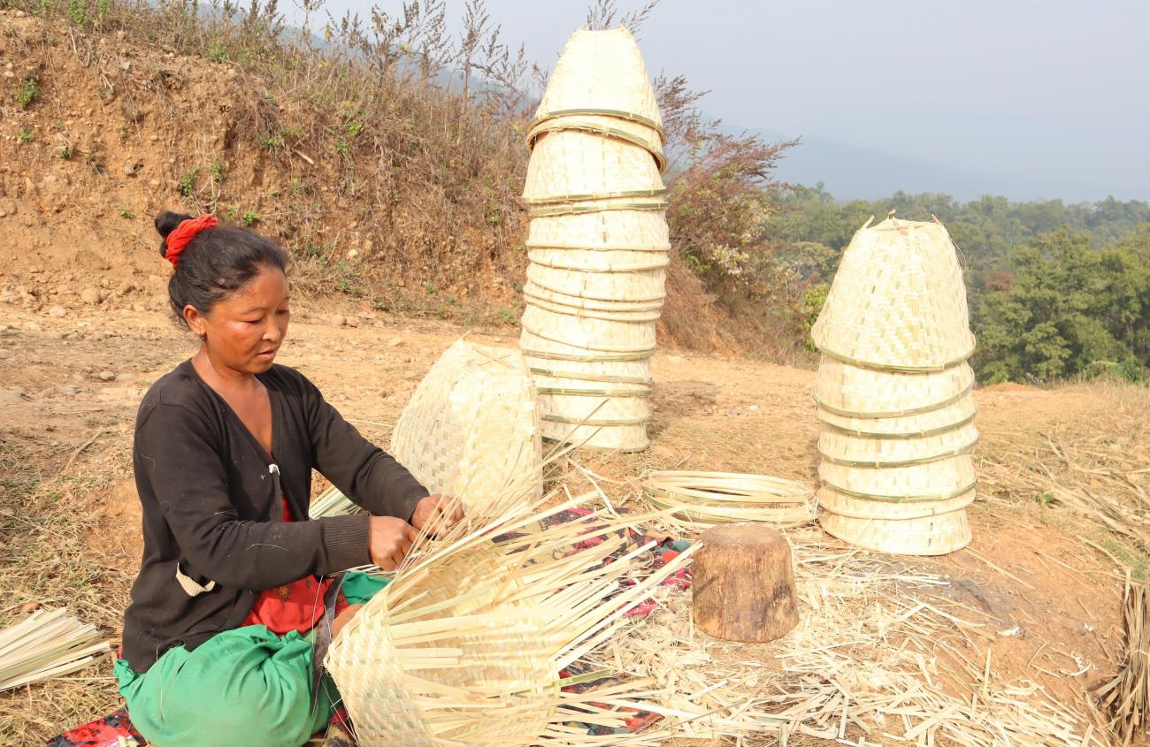 Bhujel woman in traditional bamboo weaving business (cred. Srijana Baral)