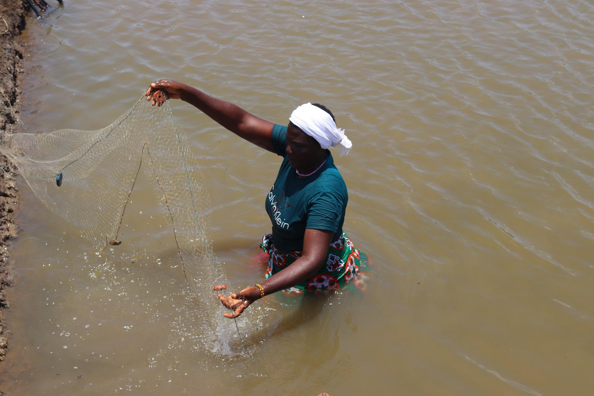 Woman fishing in Kenya